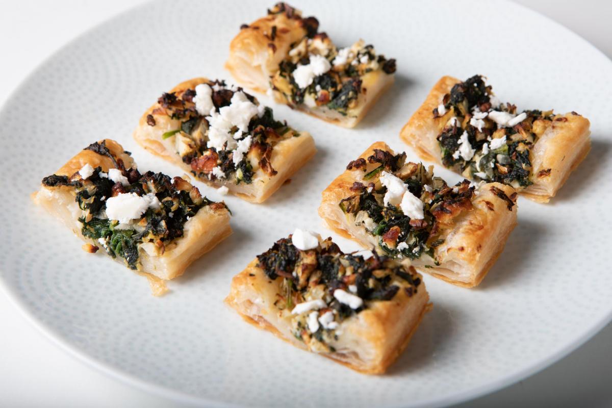 feta and spinach puffs on a plate